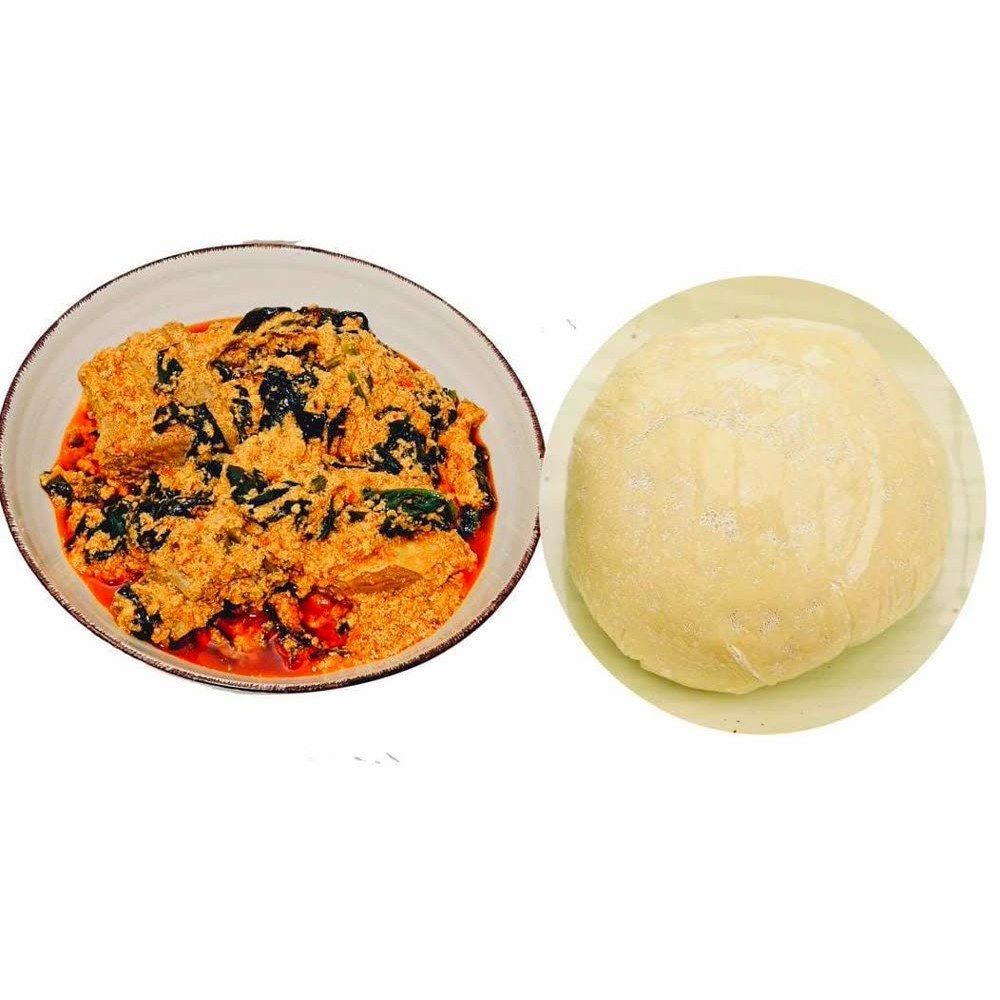 Egusi Soup mit Rindfleisch, Stockfisch und Fufu